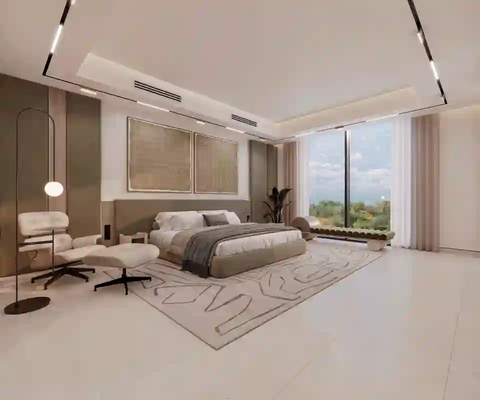 Bedroom with a lounge chair and garden view in a 5-bedroom villa